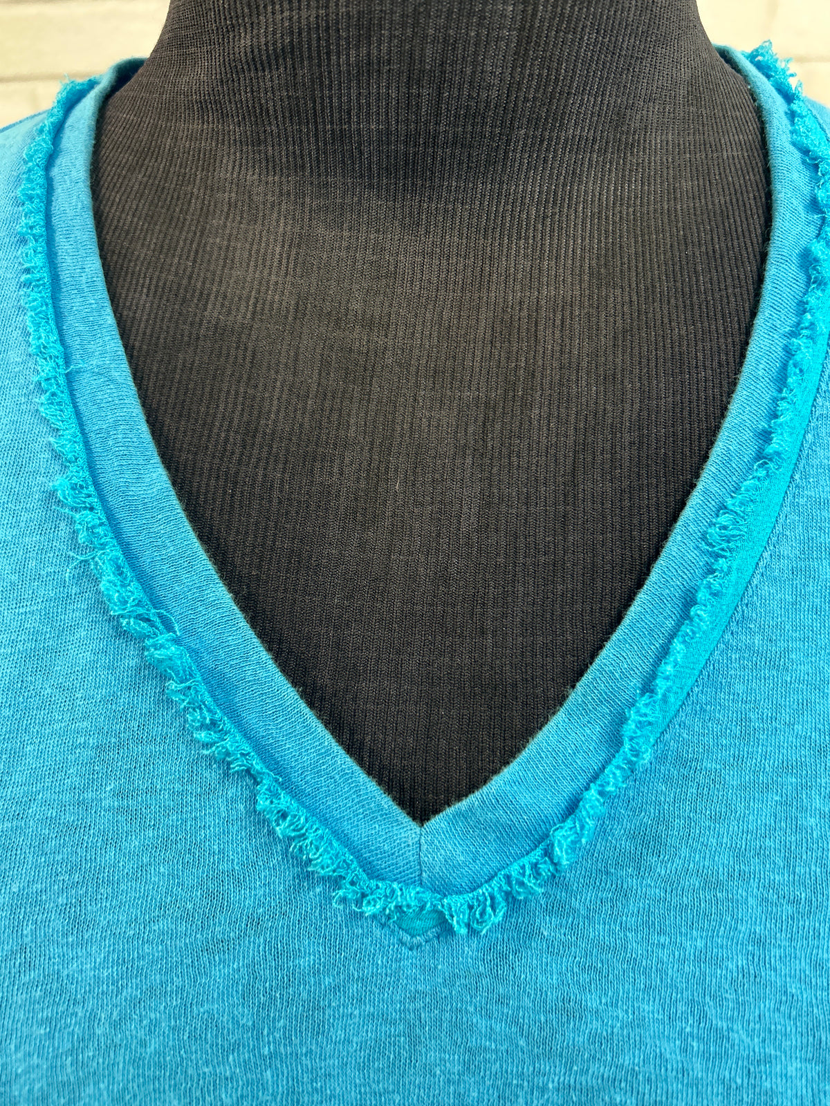 Teal Frayed Hem V-Neck